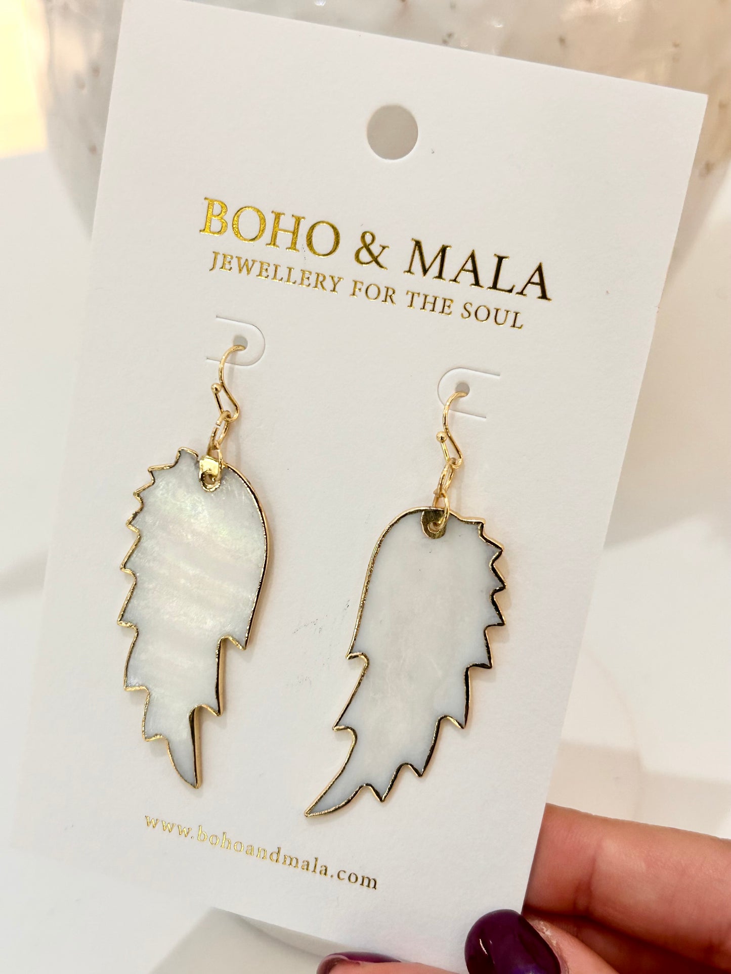 
                  
                    Ocean Feather Drop Earrings
                  
                
