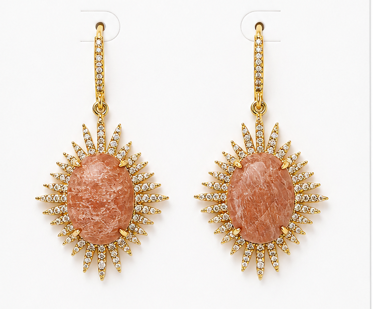 Pair of earrings on a BOHO & MALA branded card with a white background