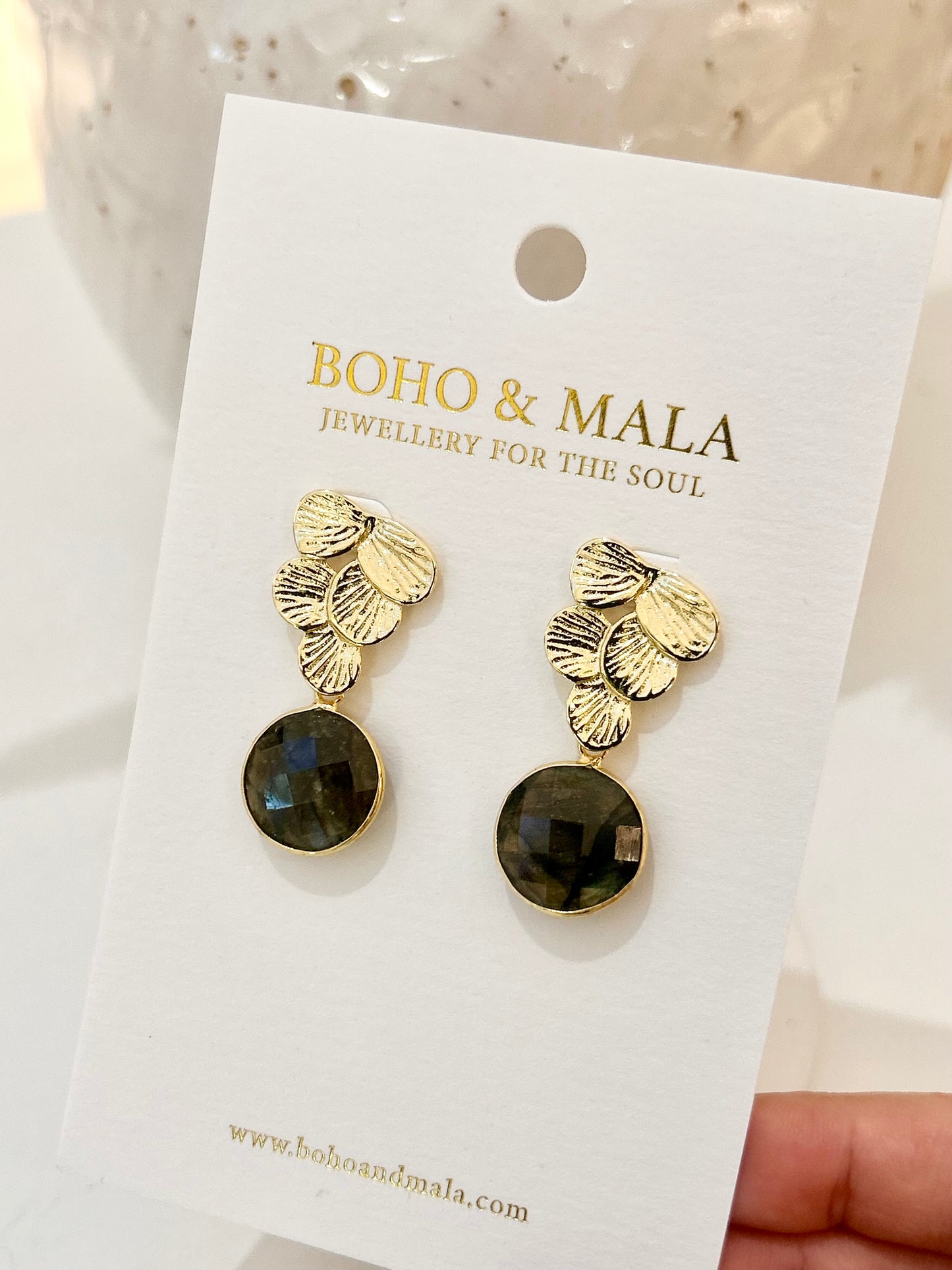 
                  
                    Labradorite earrings on a 'Boho & Mala' branded card.
                  
                