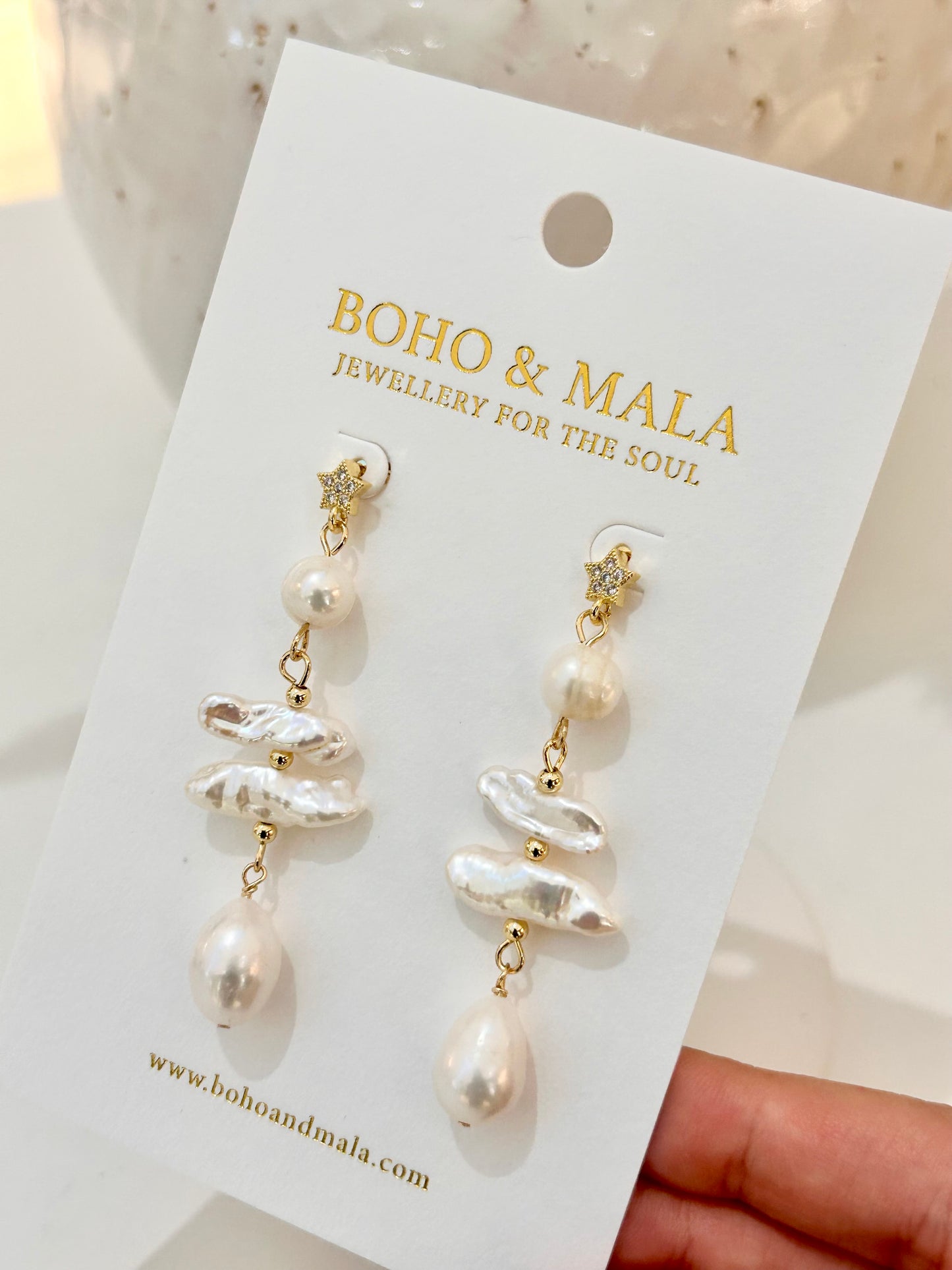
                  
                    Celestial Pearl Drop Earrings
                  
                
