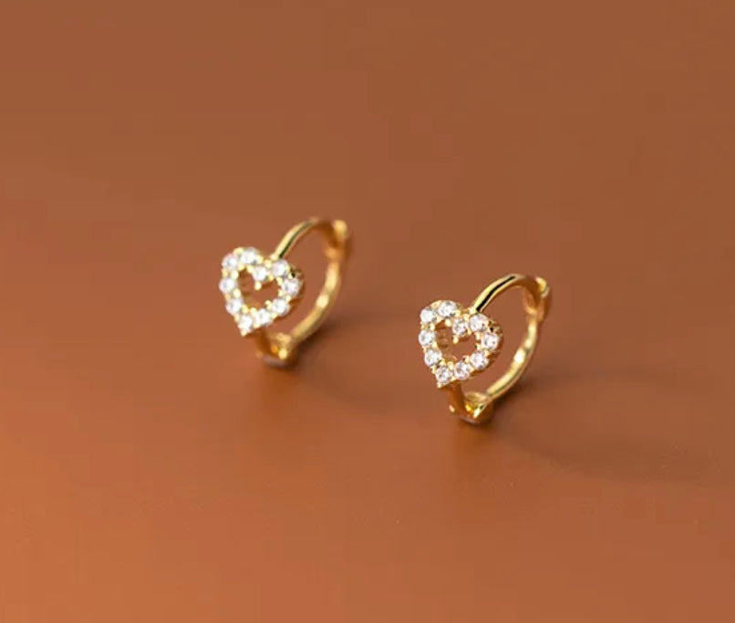 
                  
                    Boho & Mala Heart Huggies 18k Gold Plated Hoop Earrings
                  
                