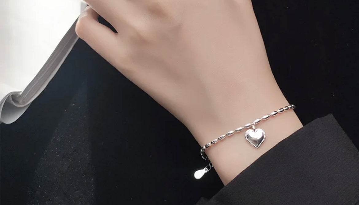 
                  
                    Boho & Mala Heart Sterling Silver Bracelet
                  
                