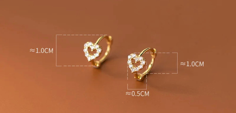 
                  
                    Boho & Mala Heart Huggies 18k Gold Plated Hoop Earrings
                  
                