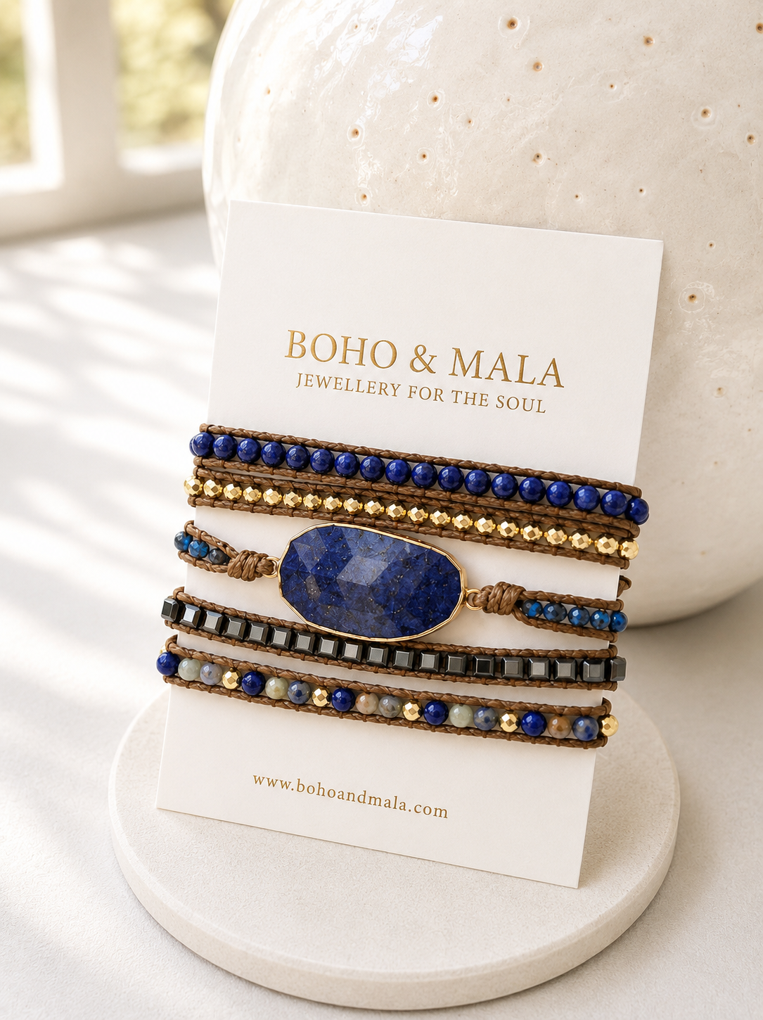 Set of beaded lapis lazuli wrap bracelets on a branded card with 'Boho & Mala' branding.