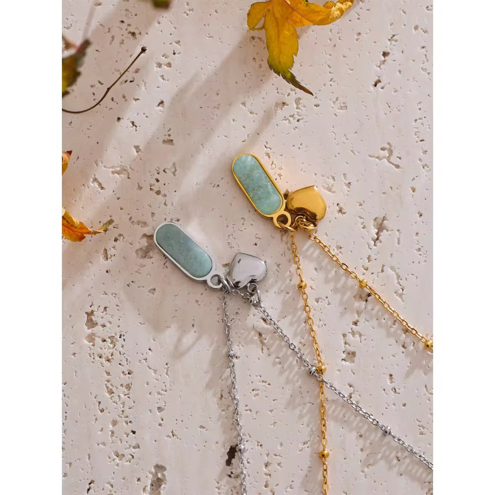 
                  
                    Aquamarine Heart Charm Necklace
                  
                