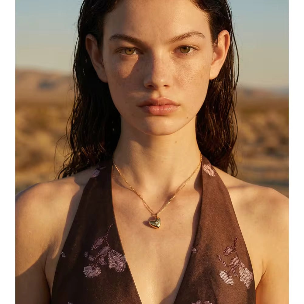 
                  
                    Golden Heart Star Necklace
                  
                