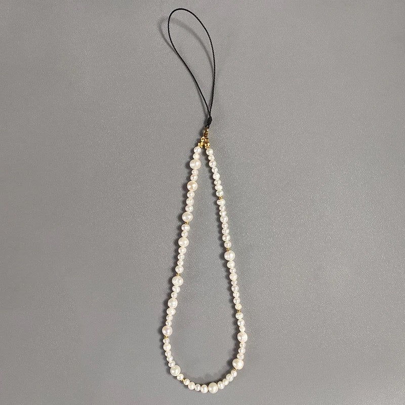 
                  
                    Boho & Mala Natural Freshwater Pearl Phone Cord Chain
                  
                