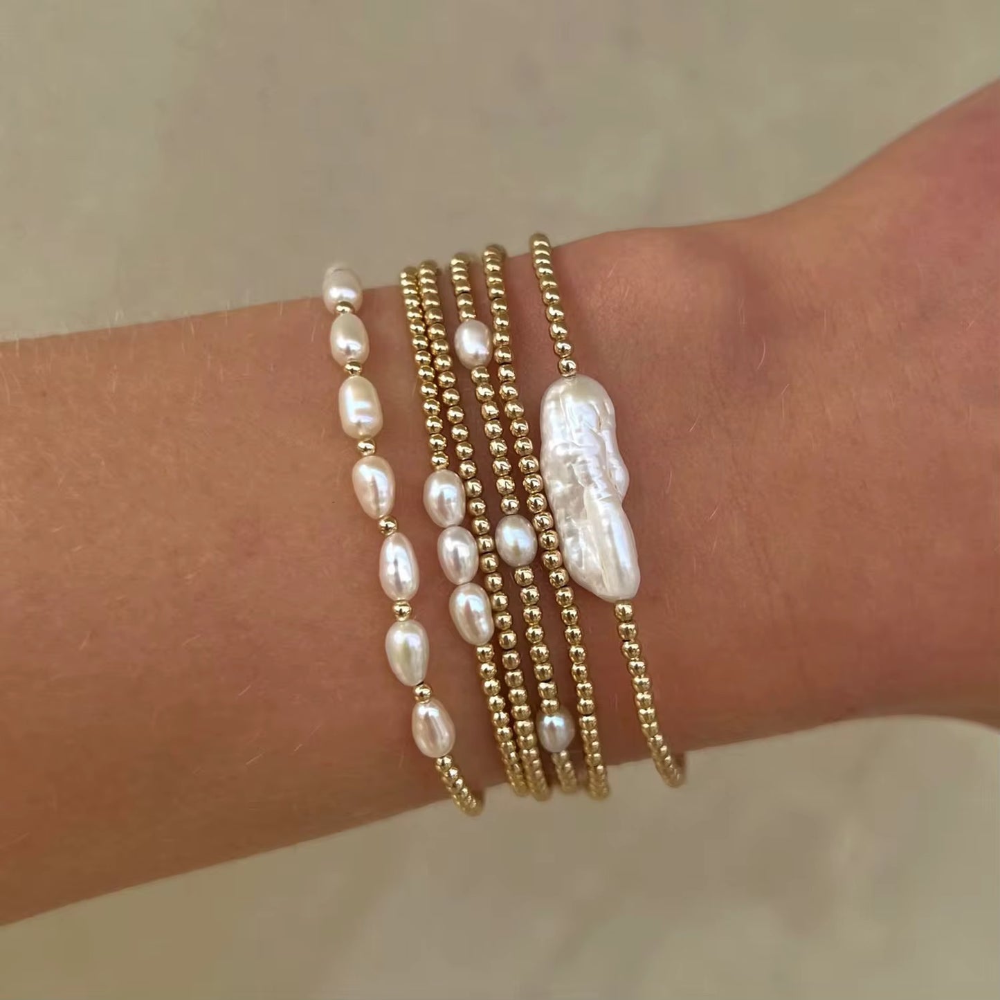 
                  
                    Boho & Mala Mini Freshwater Pearl Beaded Gold Bracelet
                  
                
