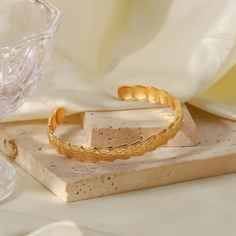
                  
                    Boho & Mala Shell Gold Plated Stainless Steel Cuff Bracelet
                  
                
