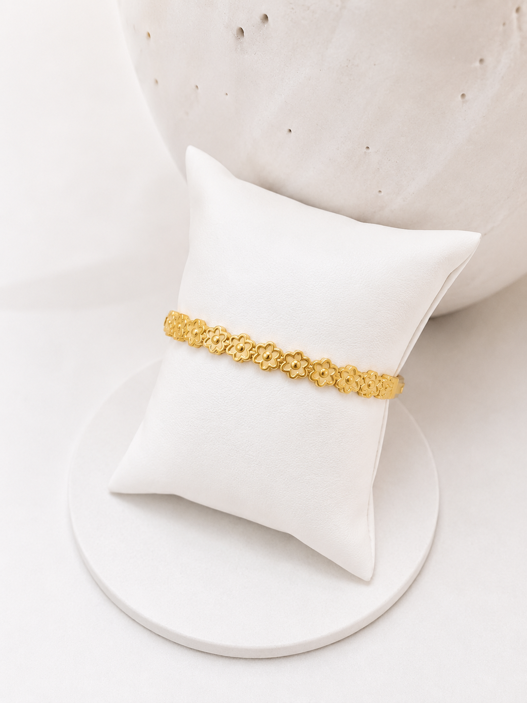 
                  
                    Gold waterproof flower bracelet with delicate floral links in PVD gold-plated stainless steel, tarnish-free everyday jewellery by Boho & Mala.
                  
                