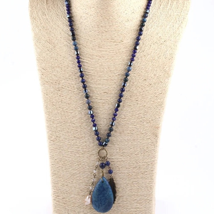 
                  
                    Boho & Mala Natural Blue Feather Tribal Stone Tassel Necklace
                  
                