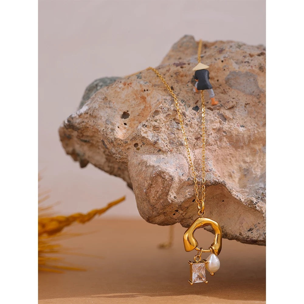 
                  
                    Boho & Mala Freshwater Pearl 18k Gold / Stainless Steel Pendant Necklace TN101010
                  
                