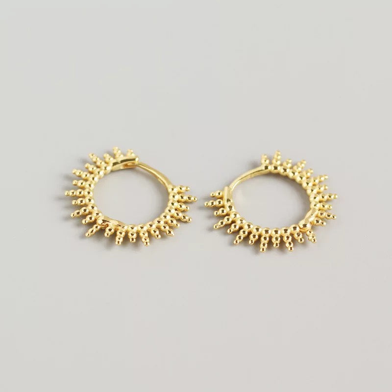 
                  
                    Gold huggies hoop earrings at Boho & Mala
                  
                